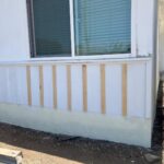 New exterior wood trim installed during a localized repair before painting
